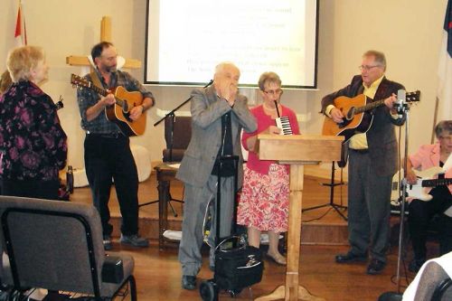 Garry Frizzell, Ken and Freya Gibson, Ron Lemke and Lois Weber provided special music at the River of Life Christian Fellowship's first anniversary service